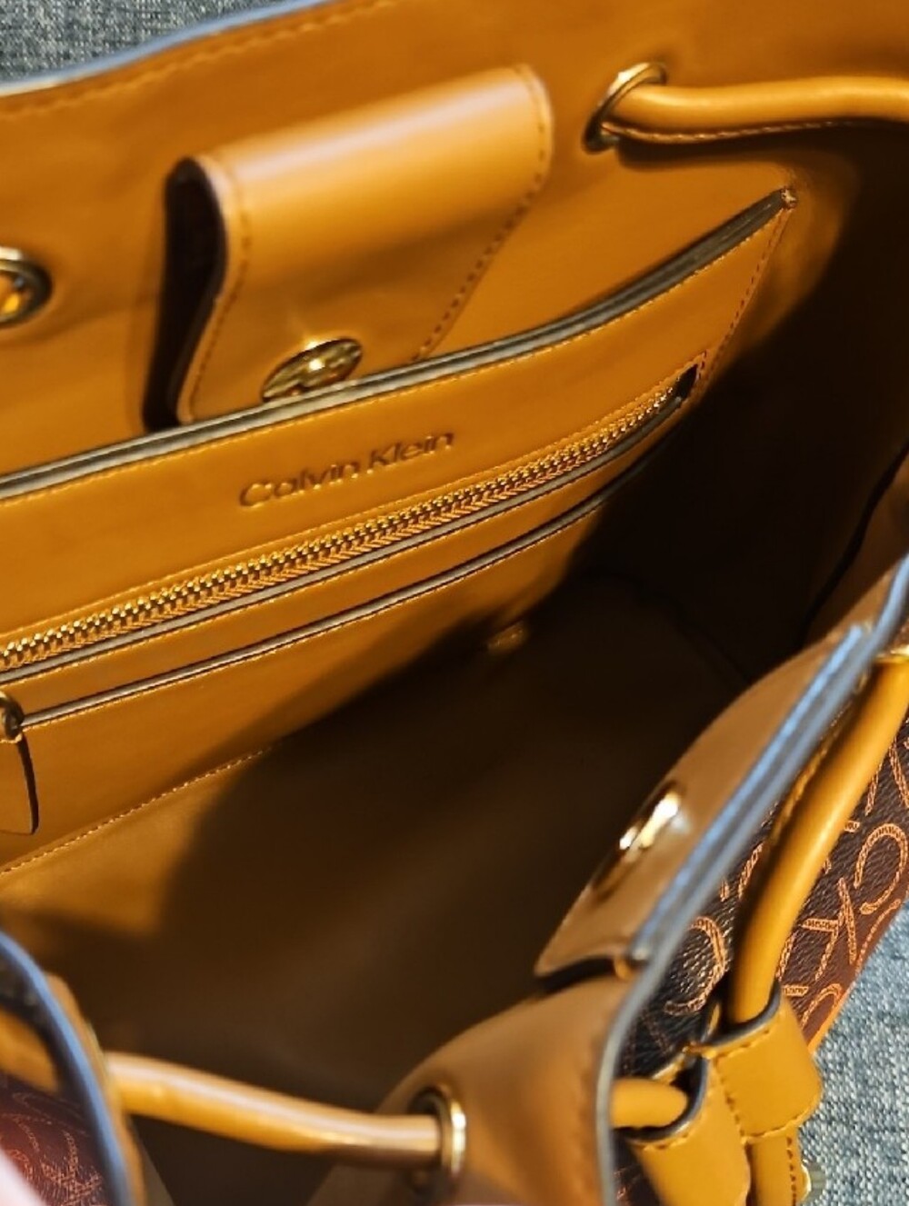 Calvin Klein Brown & Orange Gradient Monogram Drawstring Crossbody Bag - Picture 6 of 8